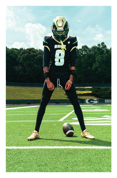A football player wearing a black and white uniform with the number 10 on the back. AI generated content
