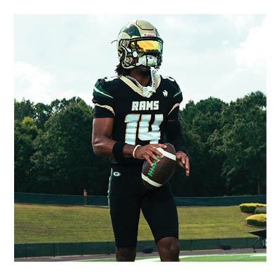 A football player in a white jersey with the number 85 on it is trying to catch a football. AI generated content