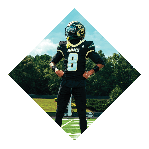 A female football player is kicking a football on a field. AI generated content