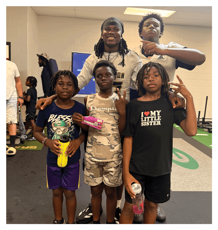 A group of football players walking on the field. AI generated content