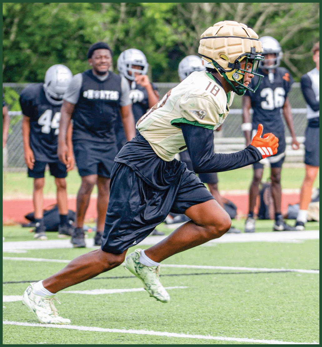 A football player running on the field. Description generated by AI