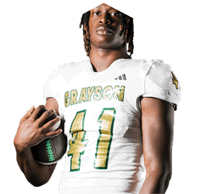 A young man wearing a white jersey with the number 10 on it. Description generated by AI
