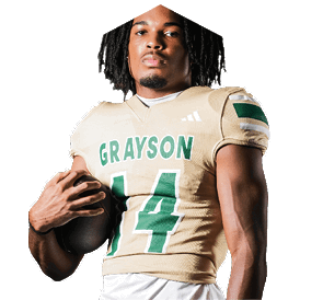 A young man wearing a white jersey with the number 10 on it. Description generated by AI