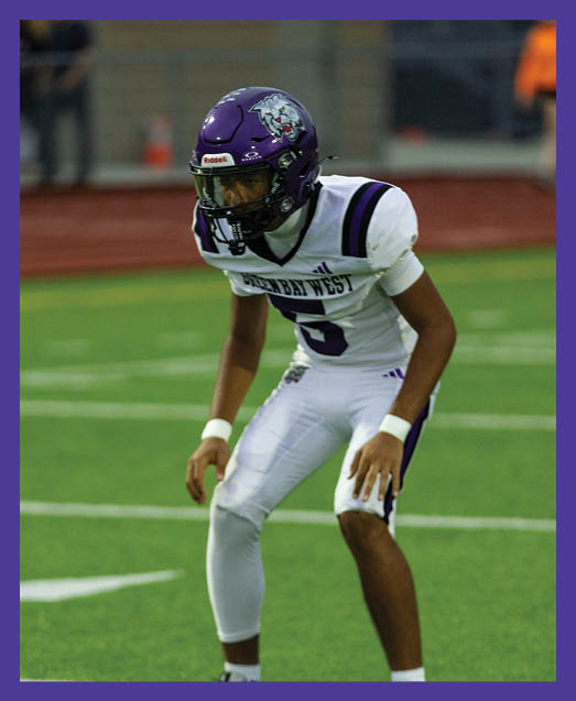 A football player in a white uniform is running with a football in his hand. AI generated content
