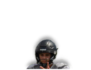 A man wearing a helmet and holding a gun. Description generated by AI