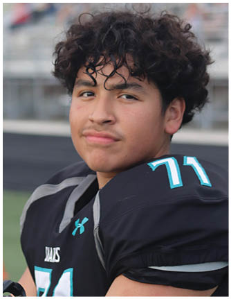 A football player wearing a black jersey with the number 41 on it. Description generated by AI