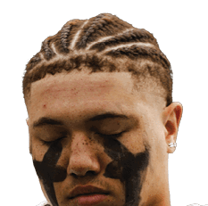 A person in a football uniform with eye black and braided hair stands with one hand on their chest and holds a helmet in the other hand. Description generated by AI