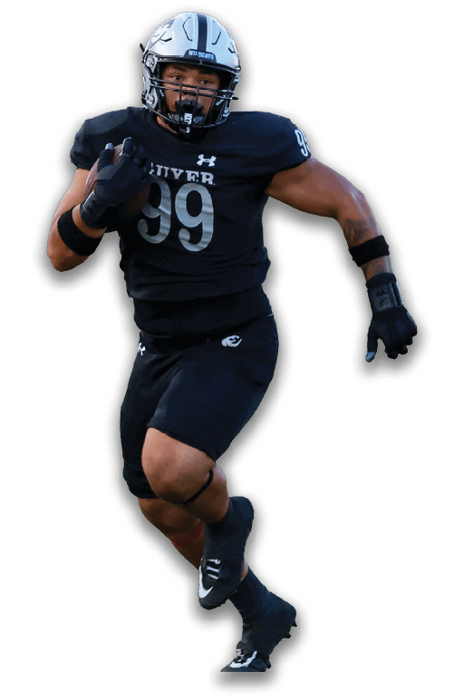 A person wearing a white football uniform with red pants and a helmet is running. Description generated by AI
