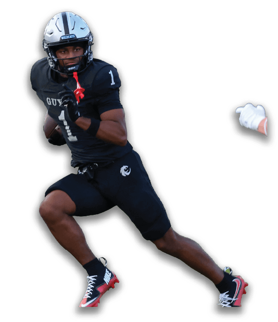 Two people in football uniforms are engaged in a play with one person in black running and the other in white reaching out. Description generated by AI