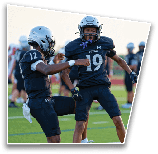 A person wearing a football uniform with the number 19 and the word “Guyer" is on a field, appearing to be in motion during a game or practice. Description generated by AI