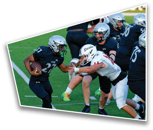A group of people wearing white football uniforms and helmets are walking together on a green field during a game. Description generated by AI
