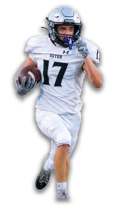 A person wearing a silver football helmet and white jersey with the number 17 and the word Guyer is raising a gloved fist. Description generated by AI