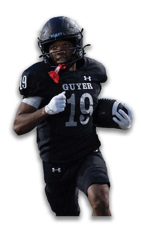 Person wearing a black sports uniform with the number 19 is running while holding a football. Description generated by AI