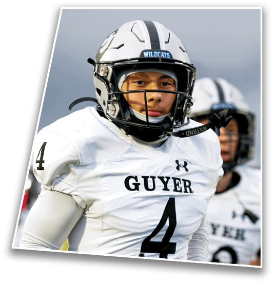 A person wearing a white football helmet with a black stripe and the word Wildcats on the front is looking forward. Description generated by AI