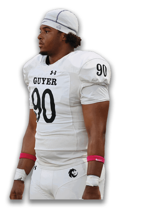 A person wearing a white football uniform with the number 90 and the word “GUYER" on the chest, along with pink wristbands. Description generated by AI