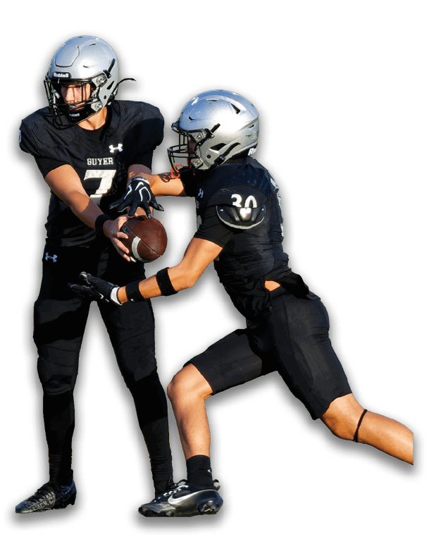 Two people wearing black football uniforms and silver helmets are engaged in a handoff with one holding a football and the other reaching to receive it. Description generated by AI
