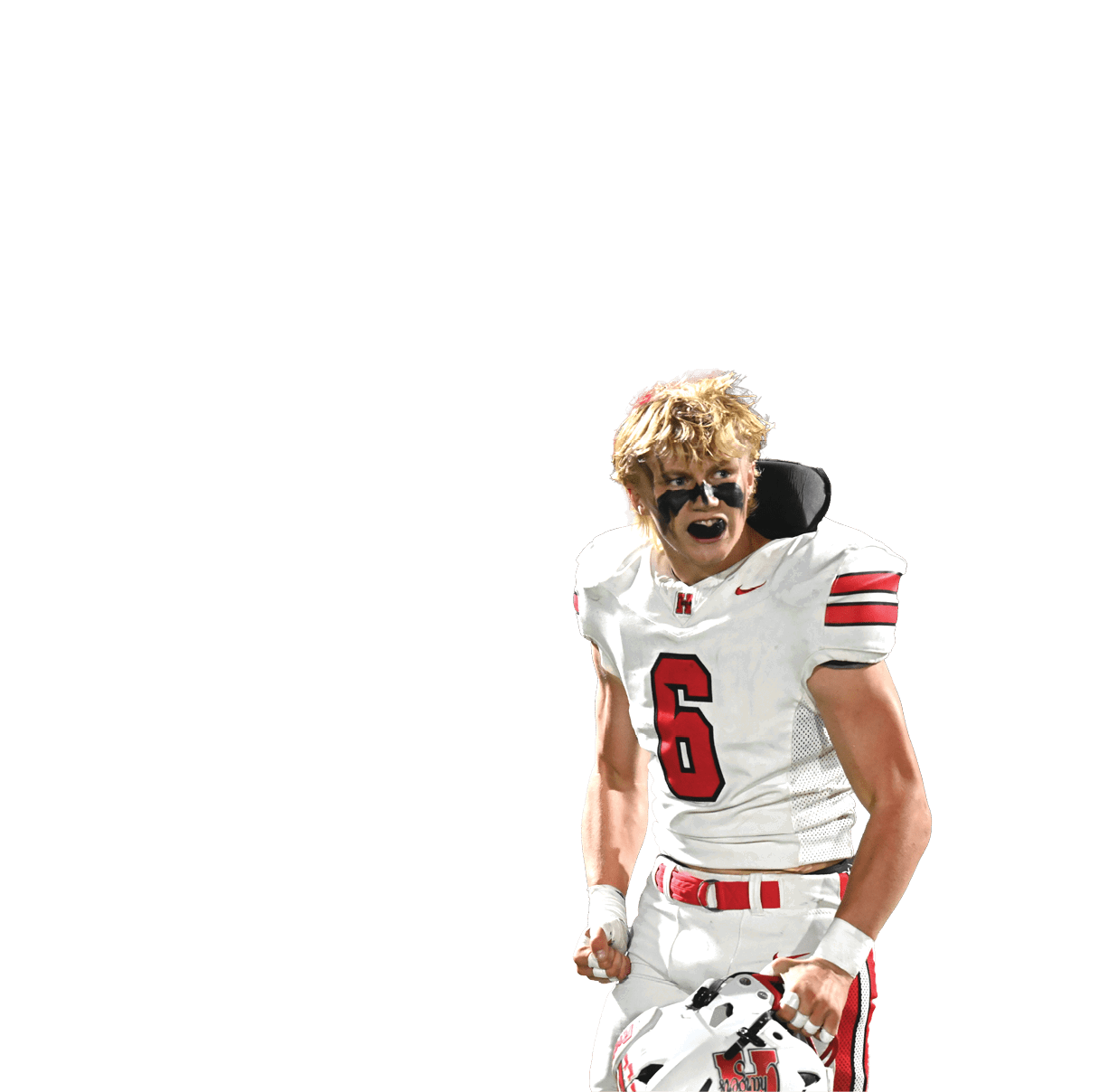 Two people in white football uniforms with red stripes and numbers are celebrating on a field under bright lights. Description generated by AI