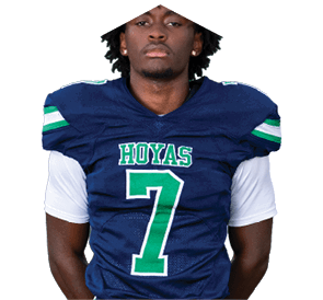 A young man wearing a white jersey with the number 10 on it. Description generated by AI