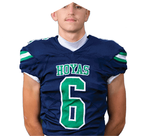 A young man wearing a white jersey with the number 10 on it. Description generated by AI