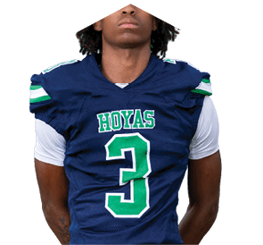 A young man wearing a white jersey with the number 10 on it. Description generated by AI