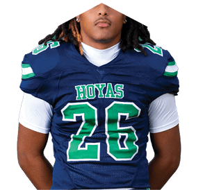 A young man wearing a white jersey with the number 10 on it. Description generated by AI