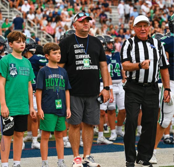 A group of football players celebrating a victory. AI generated content