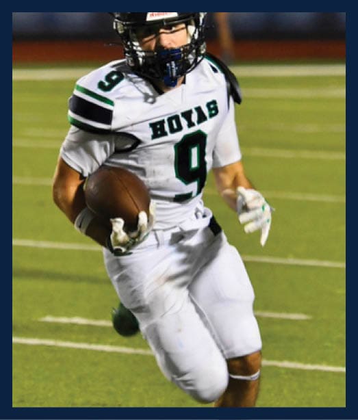 A football player in a white uniform is running with a football in his hand. AI generated content