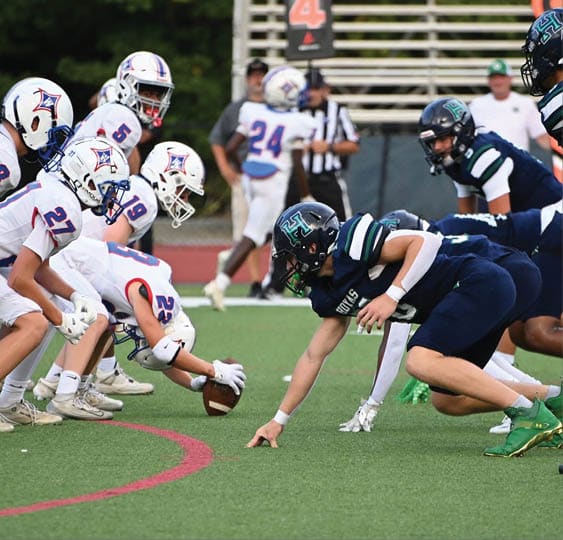 A group of football players celebrating a victory. AI generated content