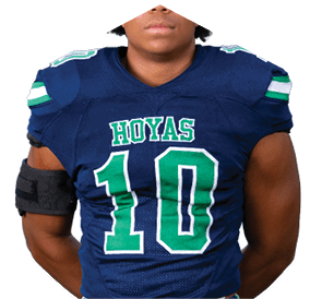 A young man wearing a white jersey with the number 10 on it. Description generated by AI