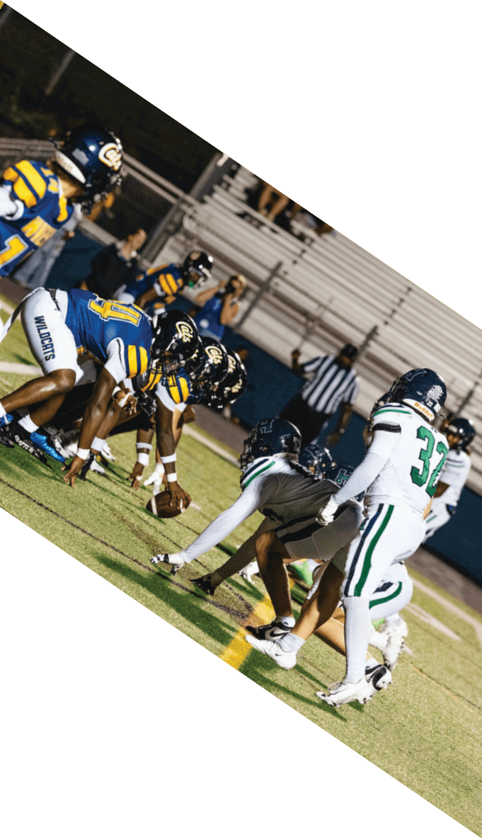A football team is gathered around a coach, listening to his instructions. AI generated content