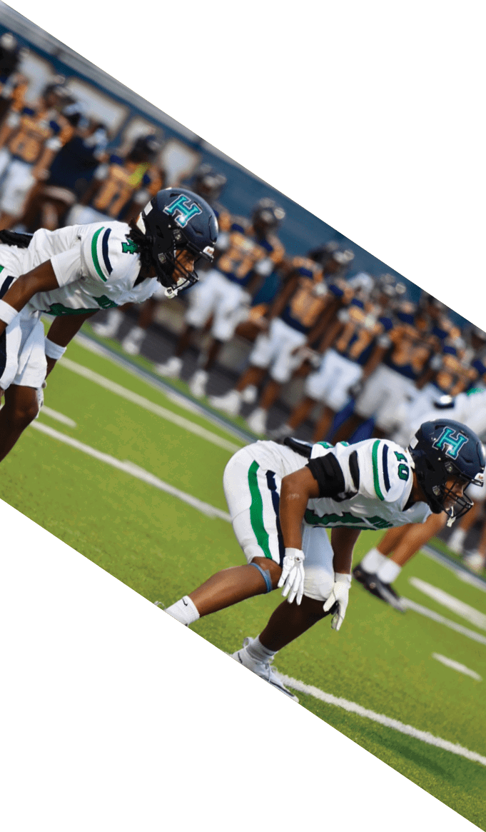 A group of people wearing black jerseys are huddled together on a field. AI generated content