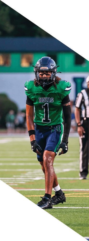 Two young men wearing football uniforms and making hand gestures. AI generated content
