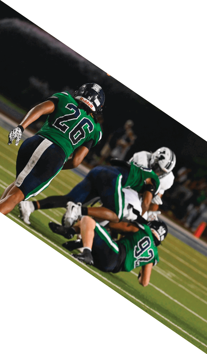 A group of people wearing black jerseys are huddled together on a field. AI generated content