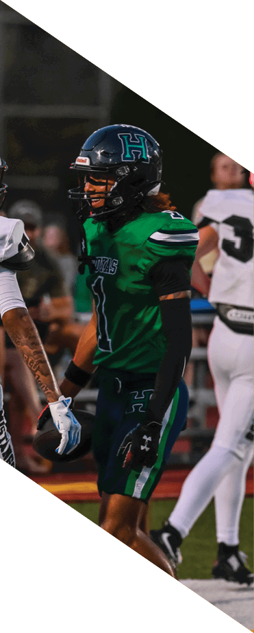A football player wearing a helmet and white uniform is holding his helmet above his head. AI generated content