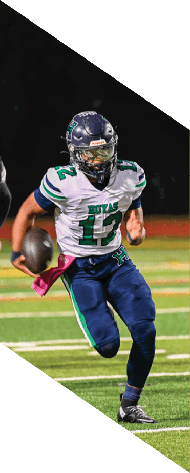 A football player wearing a helmet and white uniform is holding his helmet above his head. AI generated content
