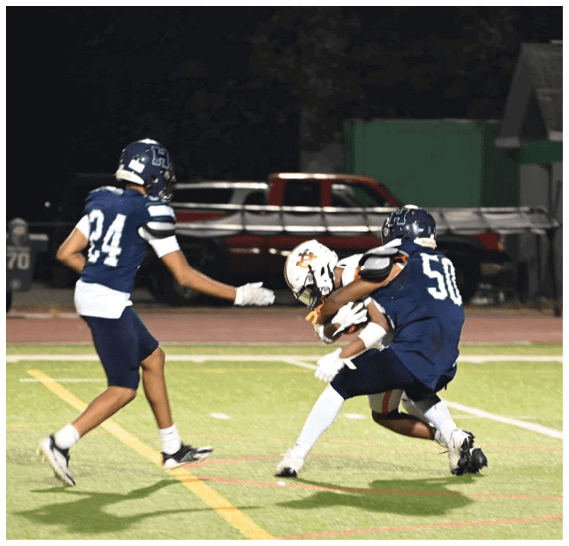 A group of football players celebrating a victory. AI generated content