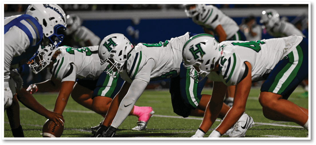 A football player running on the field. Description generated by AI