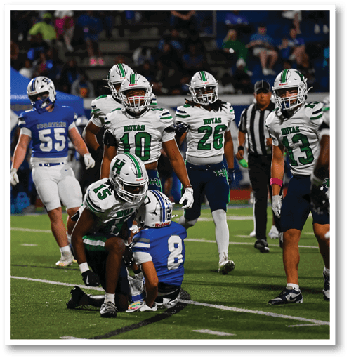 A group of men wearing black and white jerseys. Description generated by AI