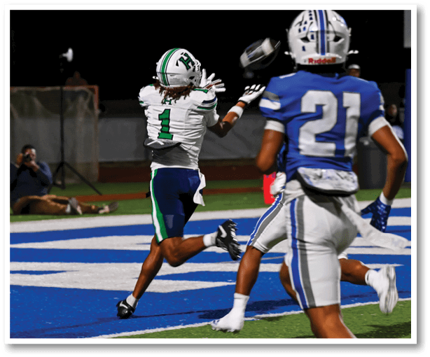 A football player is kicking a football on a field. Description generated by AI