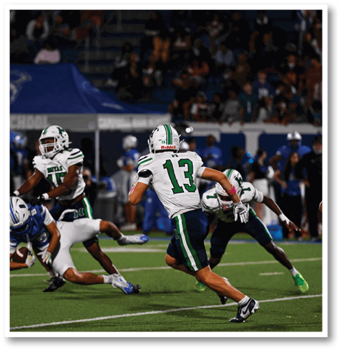 Two football players wearing black jerseys with the number 11 on them. Description generated by AI