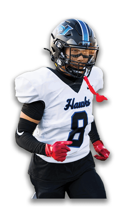 Two people in football uniforms celebrating with one holding a football and the other embracing them. Description generated by AI