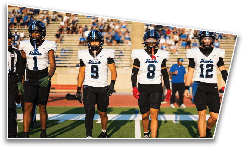 A group of people wearing football helmets and white jerseys with “LA LINDA" written on them are standing closely together on a field. Description generated by AI