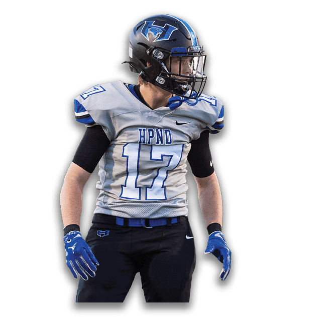 A person wearing a football helmet and a gray jersey with the number 17 and the letters HPND is looking to the side. Description generated by AI