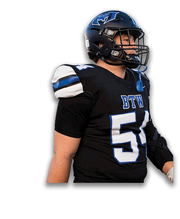 A person wearing a black football uniform with white and blue striped shoulder pads and a black helmet is shown from the side. Description generated by AI