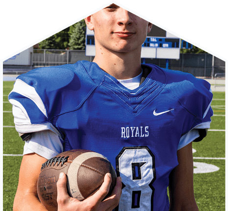 A young man wearing a white jersey with the number 10 on it. Description generated by AI