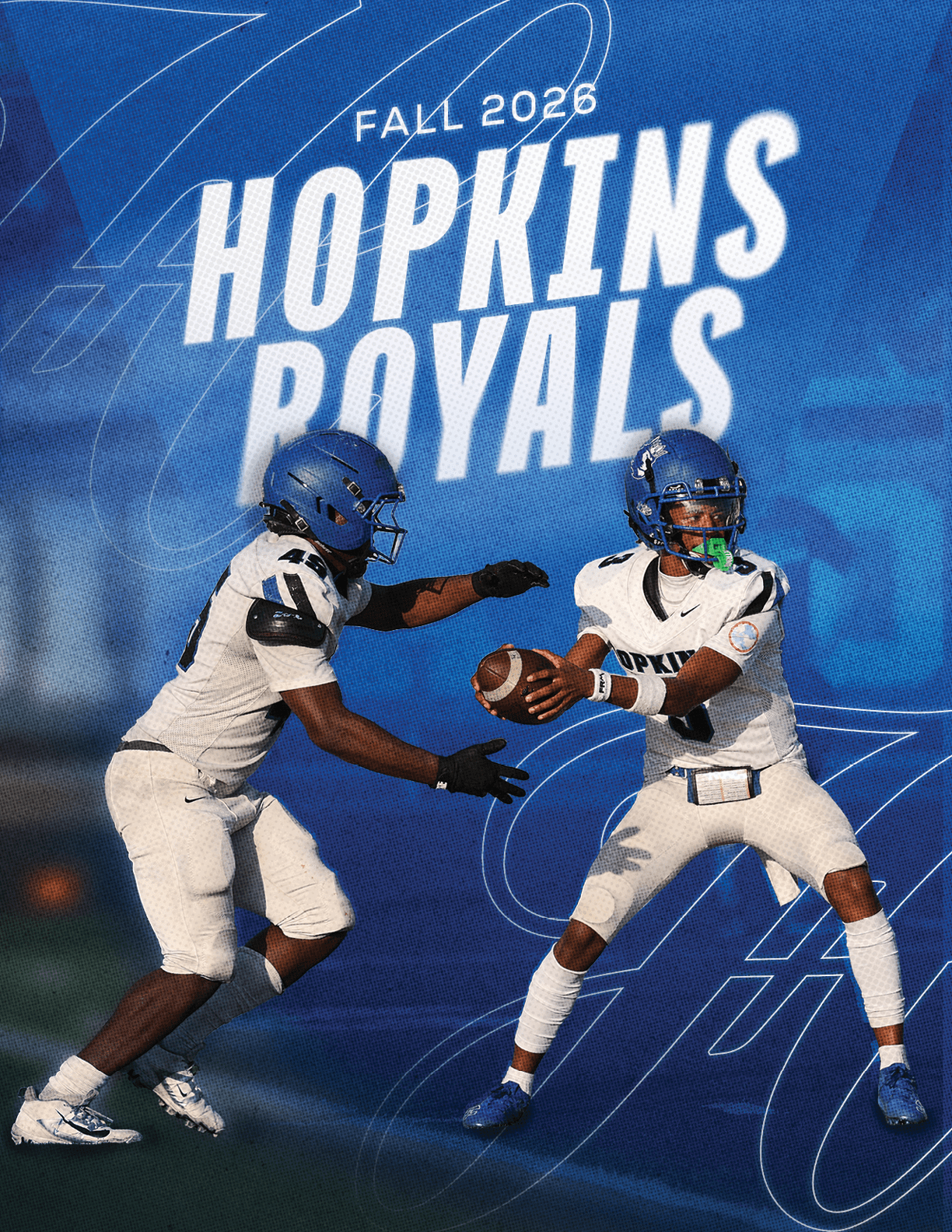A football player is tackled by another player. Description generated by AI