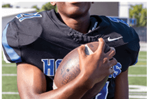 A young man wearing a white jersey with the number 10 on it. Description generated by AI