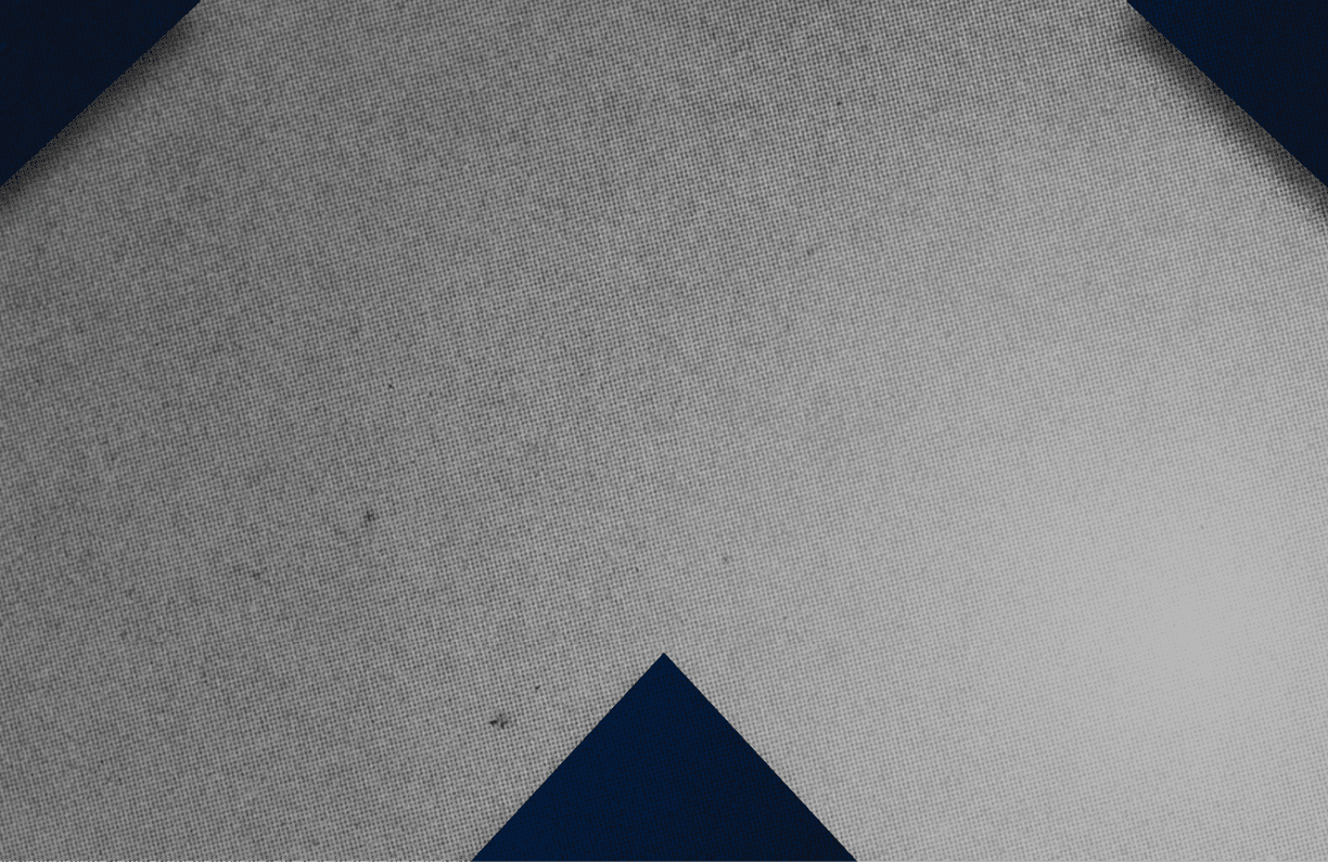 A red and black triangle. Description generated by AI