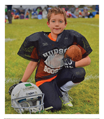 Two football players wearing black jerseys and holding hands. Description generated by AI