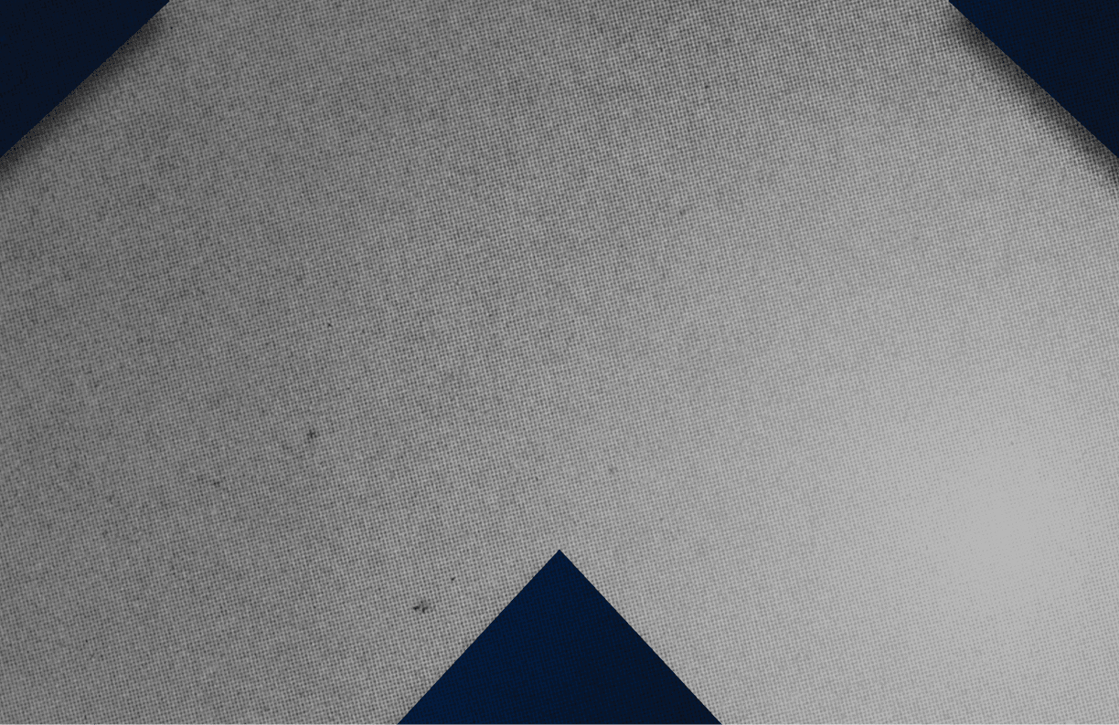 A red and black triangle. Description generated by AI